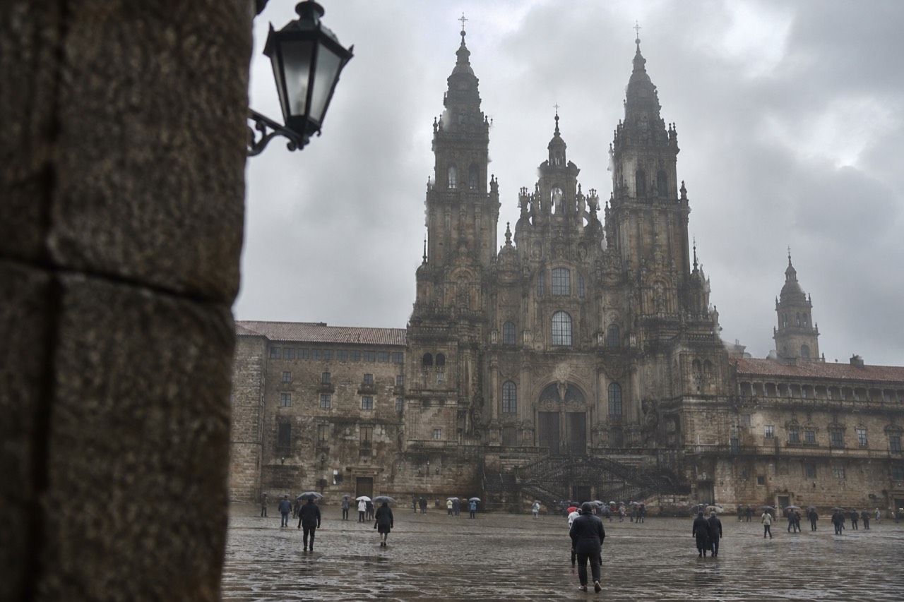 Rain clouds passing over the rooftops and cathedral towers of Santiago de Compostela