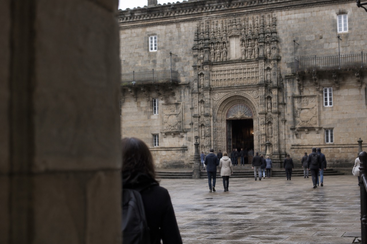 The stone facade of the Hostal dos Reis Catolicos parador on Praza do Obradoiro beside Santiago de Compostela Cathedral