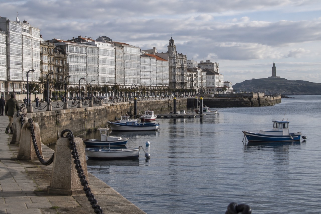The waterfront of A Coruña seen from the promenade on a bright afternoon