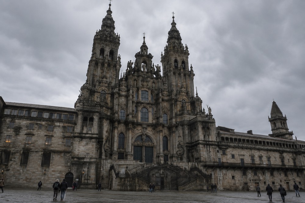 Wide evening panorama of the old town and cathedral towers from the Alameda Park balustrade