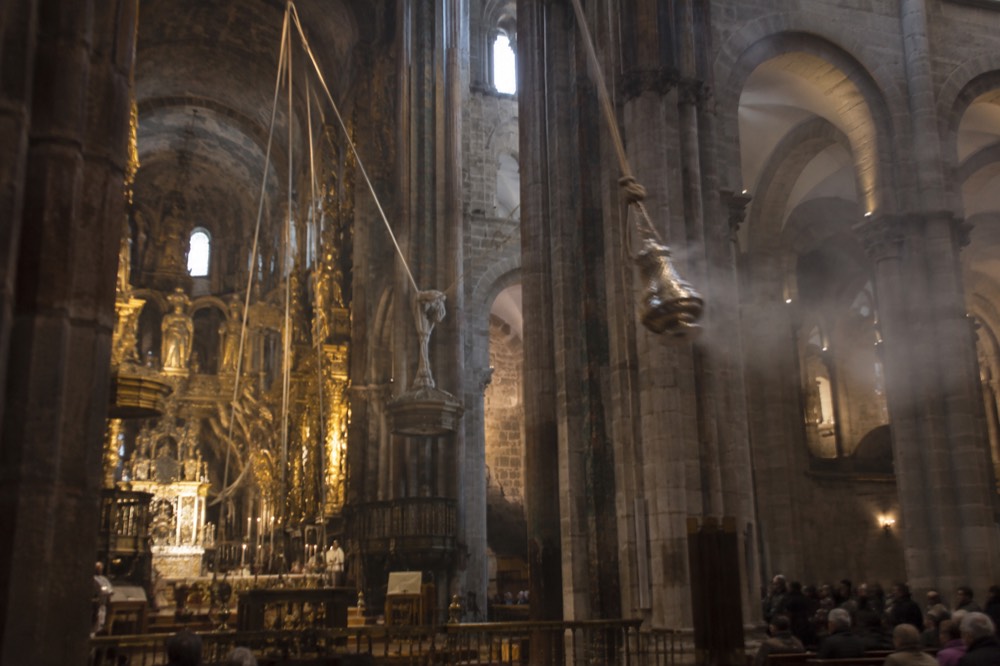 Interior nave of Santiago de Compostela Cathedral with the high altar and botafumeiro roping