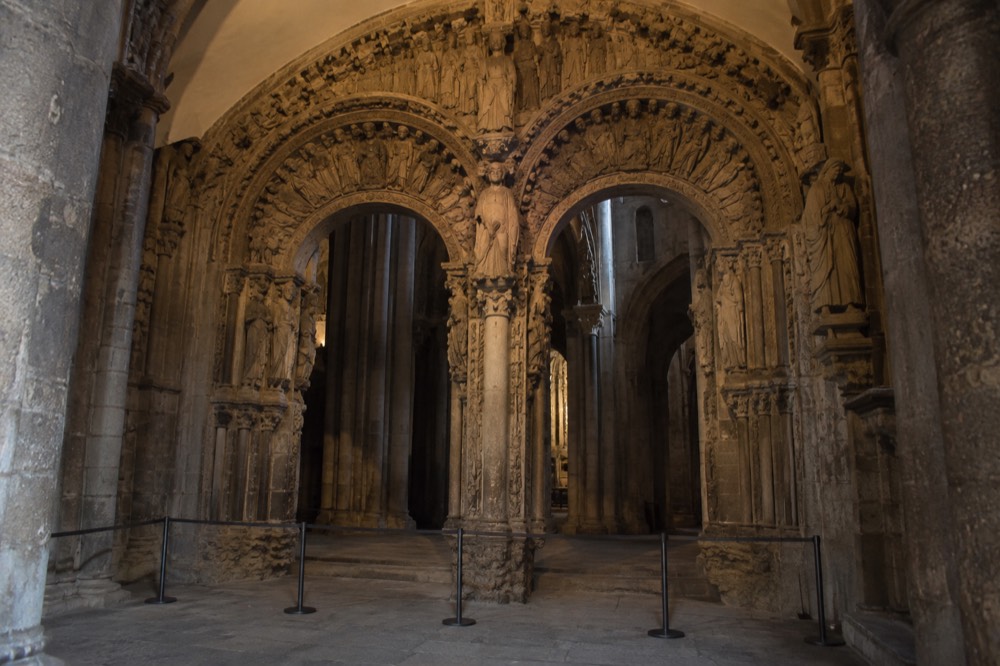 Carved stone figures of the Portico da Gloria portal inside Santiago de Compostela Cathedral