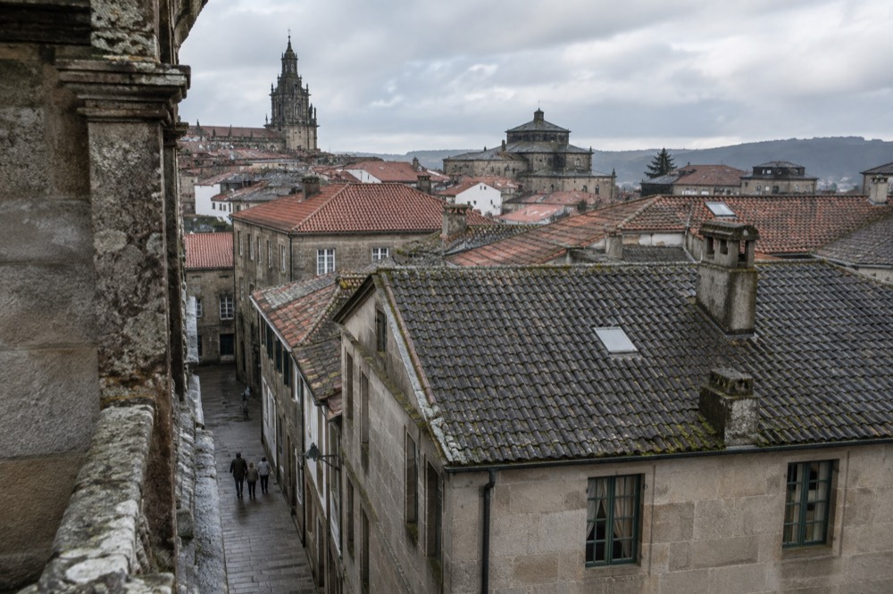 Stone rooftops of Santiago de Compostela old town seen from a cathedral tower walkway