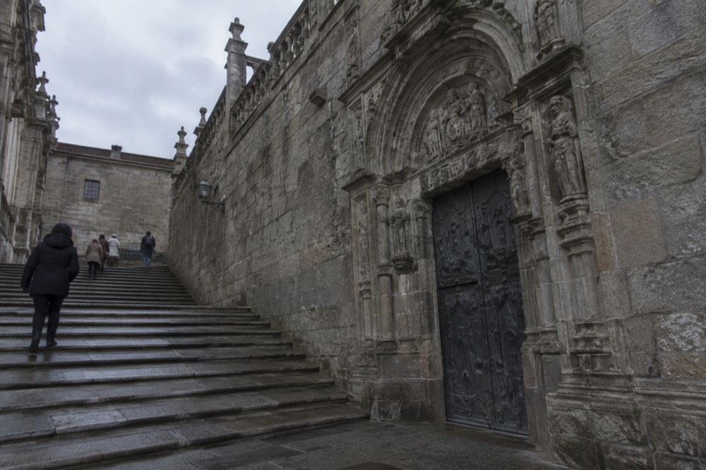 Detail of the carved stone decoration around the Holy Door showing the statue of Saint James