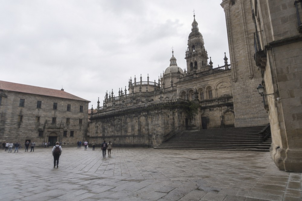 The quiet east side of the Cathedral complex seen from Praza da Quintana with its stone steps