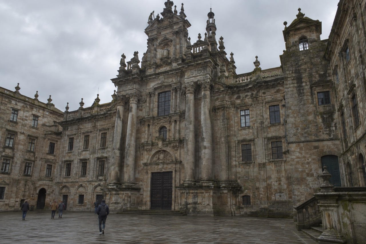 Baroque stone facade of the San Martino Pinario monastery church seen from the square in front of Santiago de Compostela Cathedral