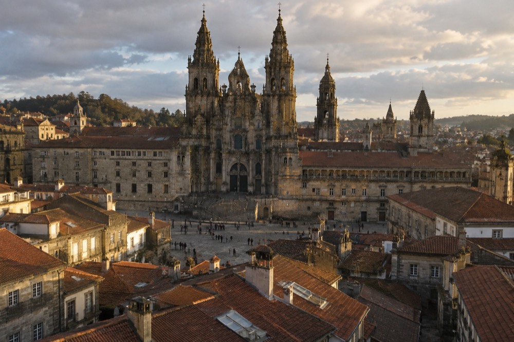 Wide view of Santiago de Compostela old town rooftops with the Cathedral towers rising above the monastery complex