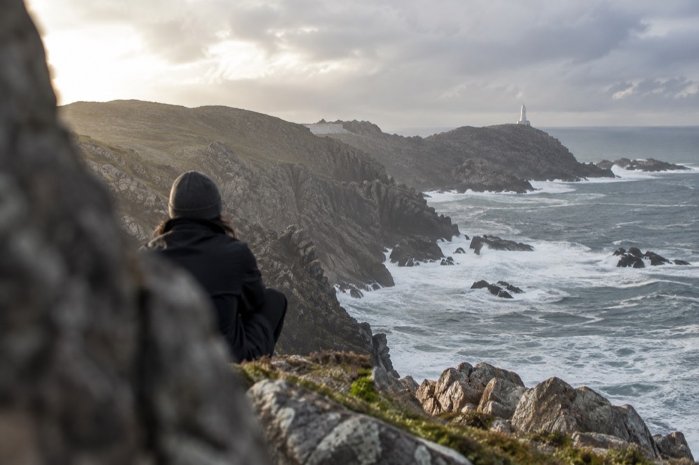 A rocky Atlantic coastline with waves breaking against cliffs along the Costa da Morte