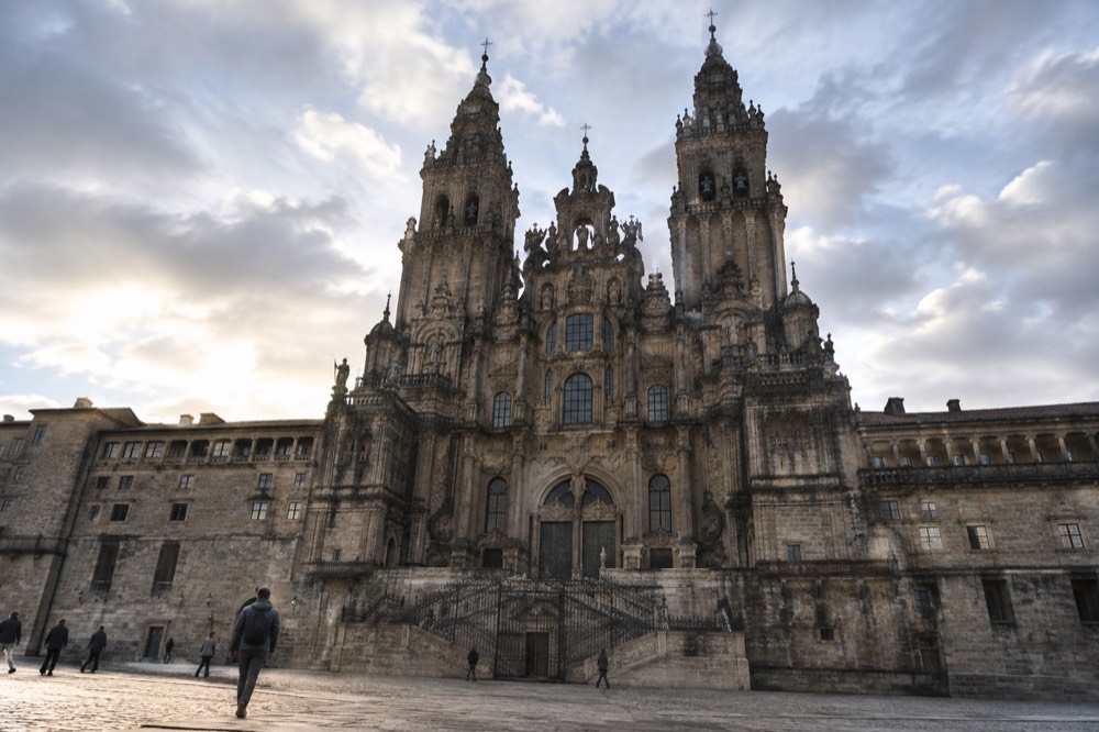 The baroque facade of Santiago de Compostela Cathedral seen from its square