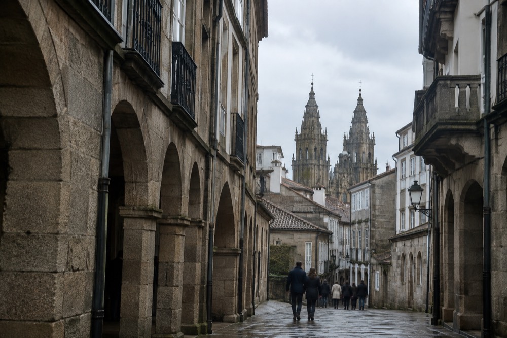 The baroque twin towers of Santiago de Compostela Cathedral rising above the rooftops of the old town