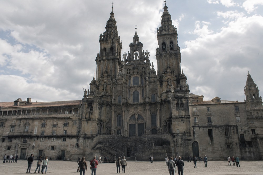 The baroque facade and towers of the Cathedral of Santiago de Compostela seen from Praza do Obradoiro