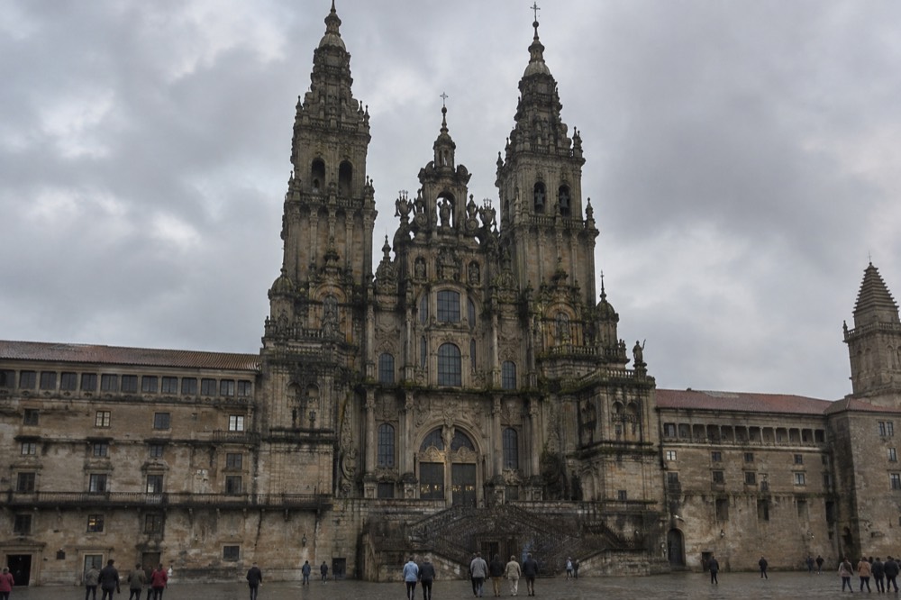The exterior of Santiago de Compostela airport terminal on an overcast morning