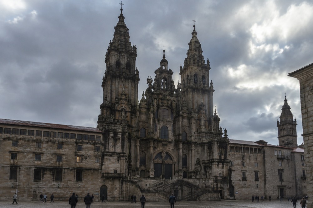 Rain clouds gathering over the rooftops and cathedral towers of Santiago de Compostela old town