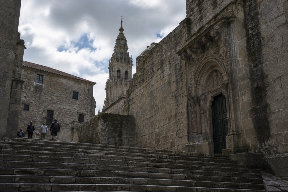 The Holy Door on Praza da Quintana seen across the stone steps
