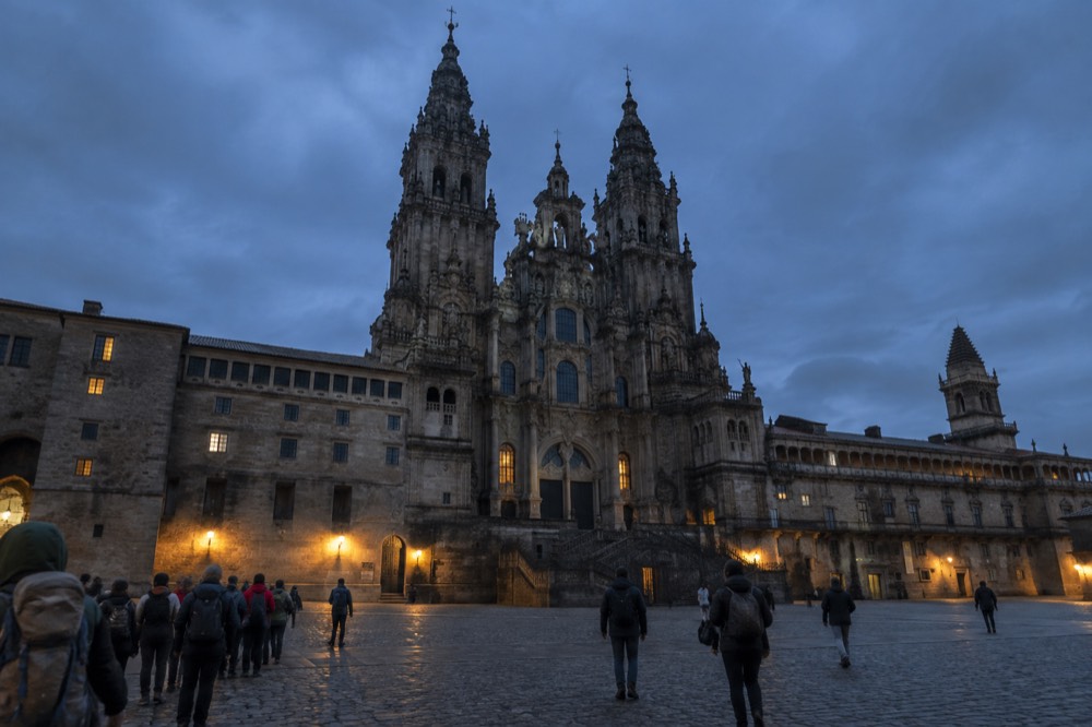 Pilgrims queueing outside the Pilgrim's Office on Rua das Carretas in Santiago de Compostela